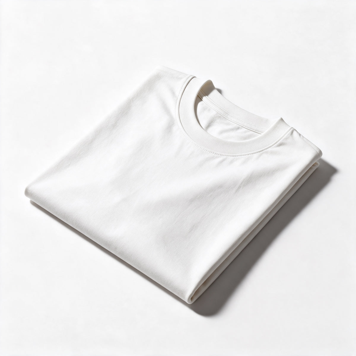 T-shirt oversize blanc uni femme à personnaliser - plié, détail du tissu