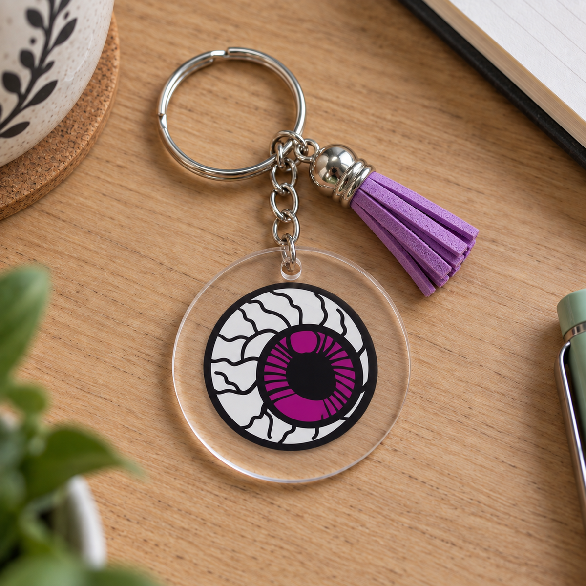 Porte-clés Halloween acrylique transparent œil sanglant iris violet avec pompon violet