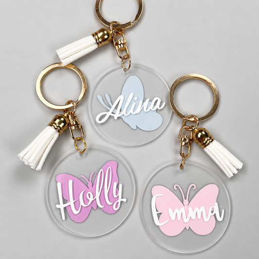 Porte-clés personnalisé prénom papillon en acrylique avec pompon blanc - EDISAMP
